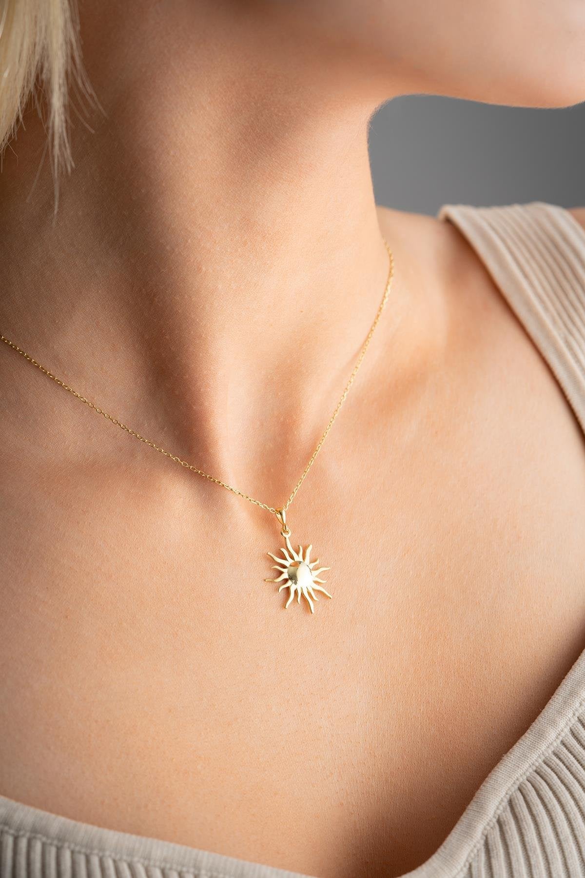 Gold plated sun design necklace