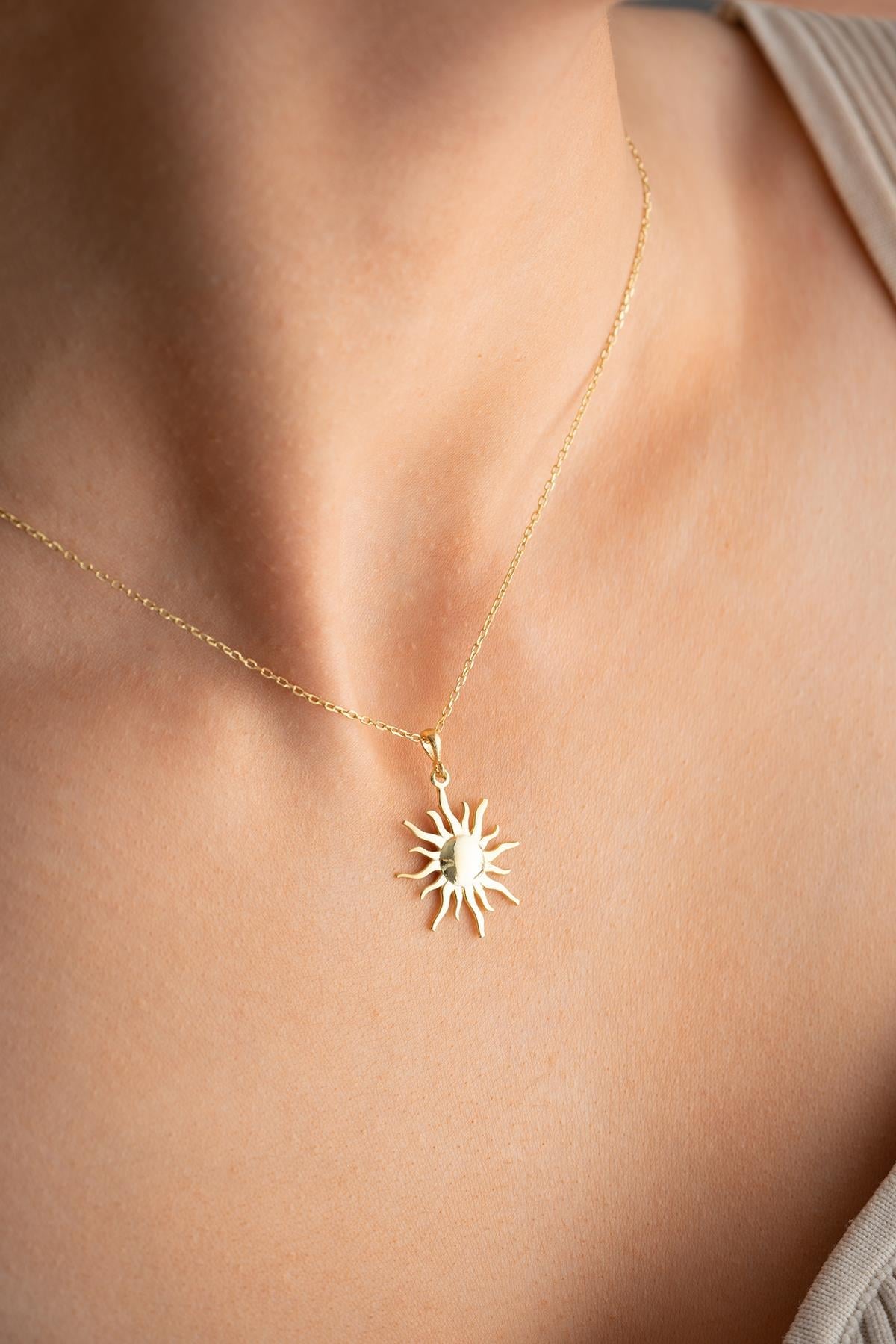 Gold plated sun design necklace