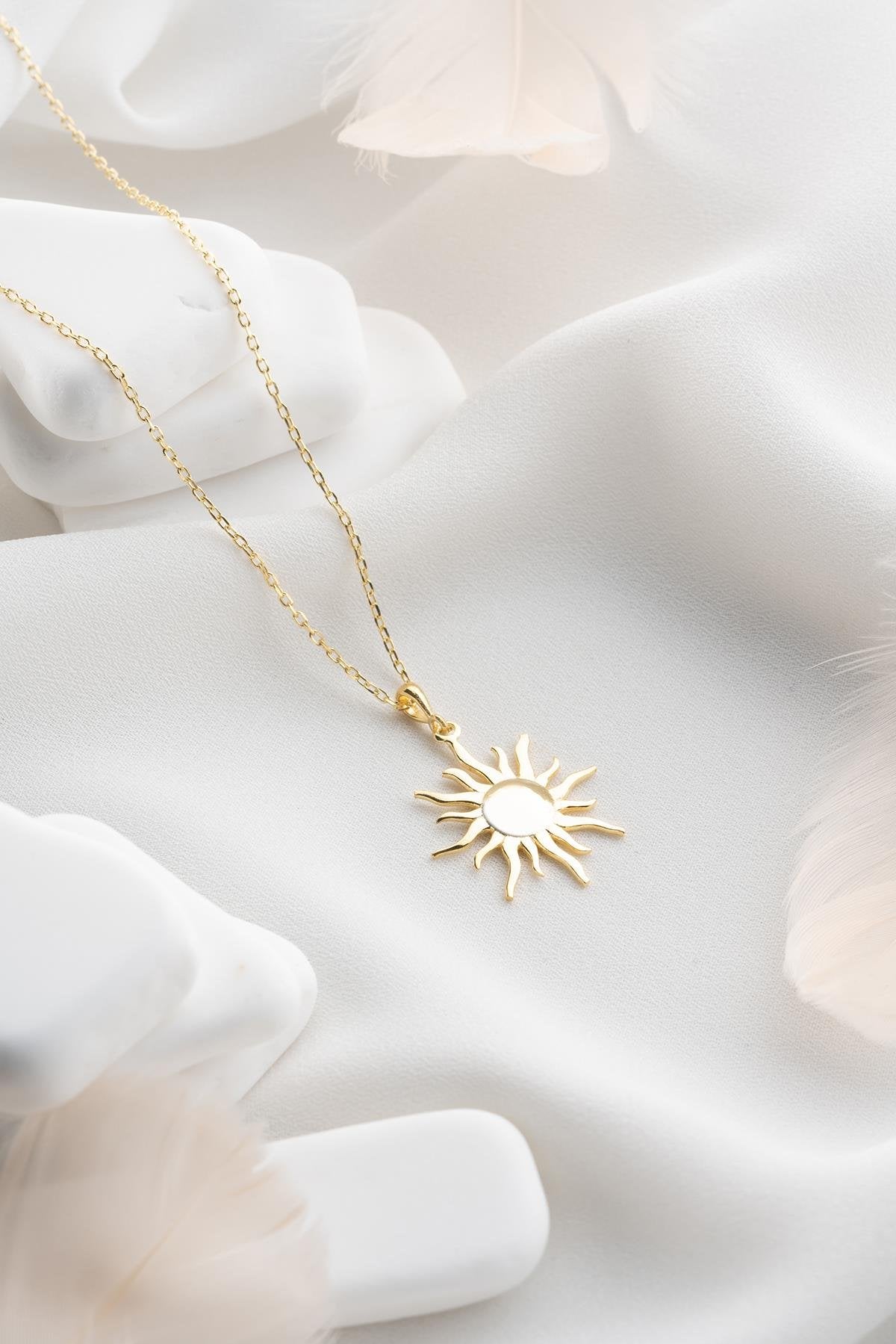 Gold plated sun design necklace