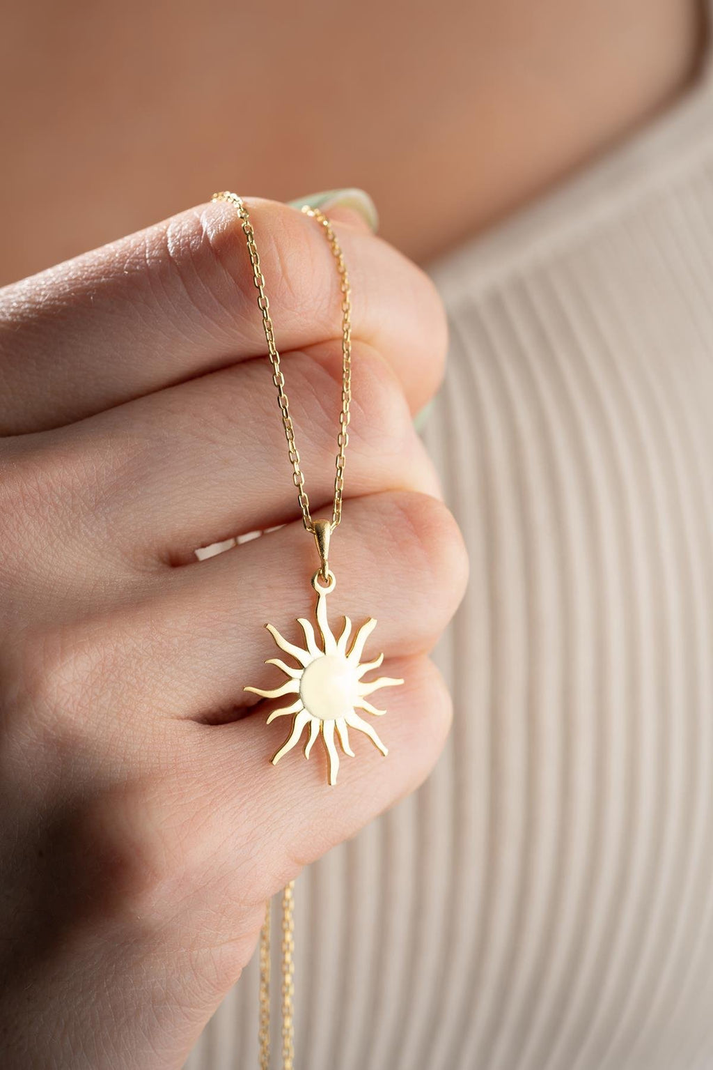 Gold plated sun design necklace
