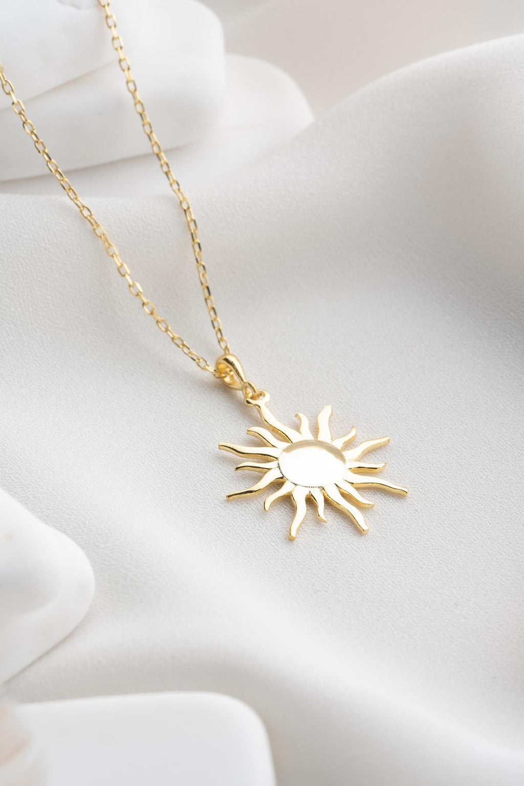 Gold plated sun design necklace