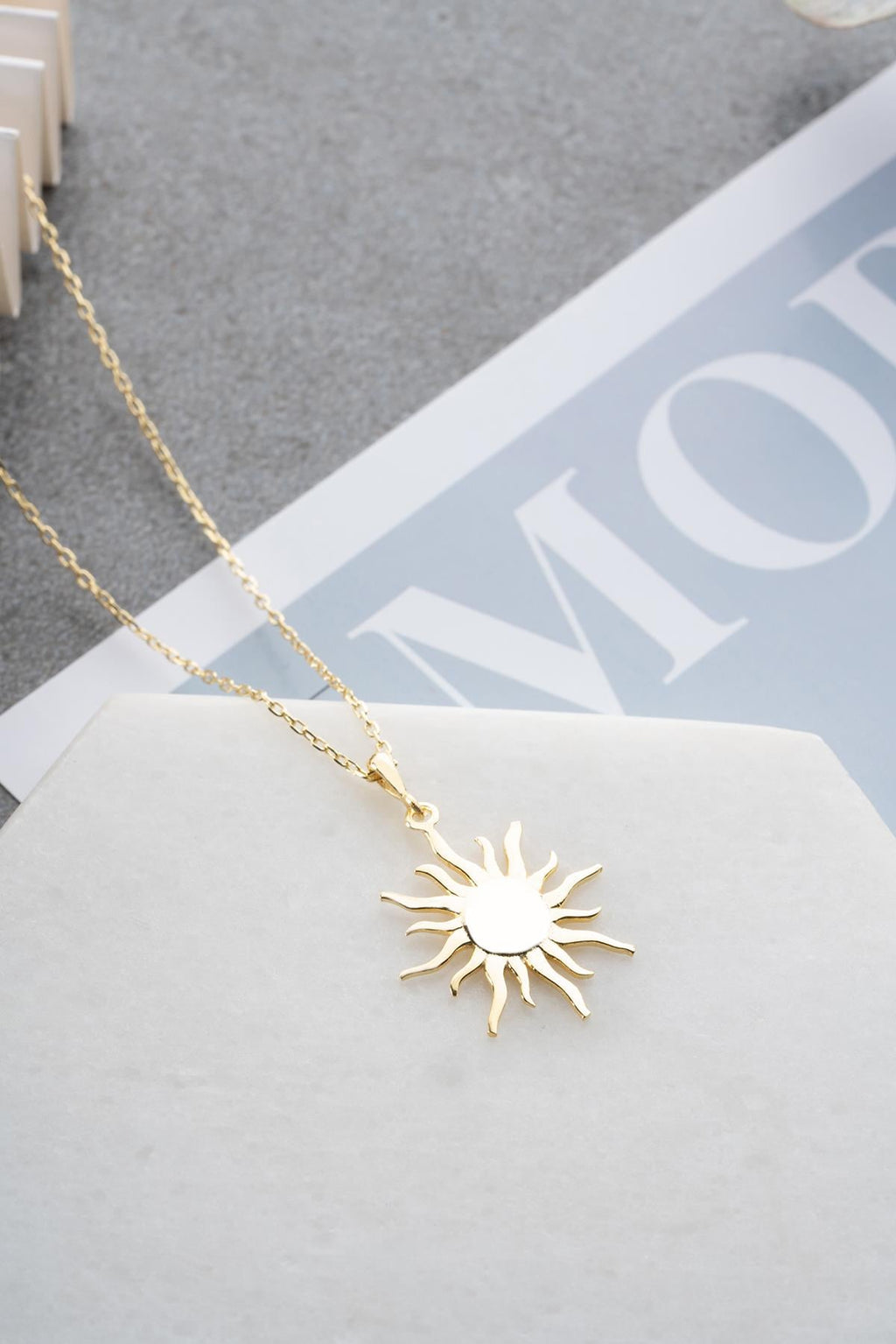 Gold plated sun design necklace